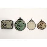 three Chinese pendants and a buckle in marked silver and jade || Lot (4) van drie Chinese