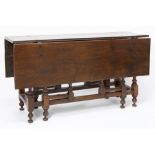 18th Cent. folding table in oak with folding base and rectangular top || Achttiende eeuwse klaptafel