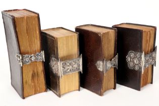 four 19th Cent. in leather bound bible books each with a silver clasp || Lot van vier negentiende