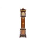 because of the small size quite rare longcase clock with its case in marquetry with porcelain