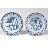 pair of 18th Cent. Chinese dishes in porcelain with a blue-white garden decor || Paar achttiende