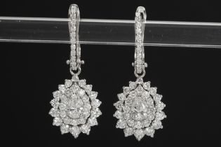 pair of classy earrings in white gold (18 carat) with ca 1,70 carat of very high quality brilliant