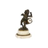 antique neoclassical sculpture with a cupid in partly decorated bronze that beats a drum, which