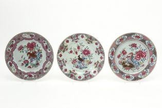 three nice 18th Cent. Chinese plates in porcelain with a 'Famille Rose' decor with bird and