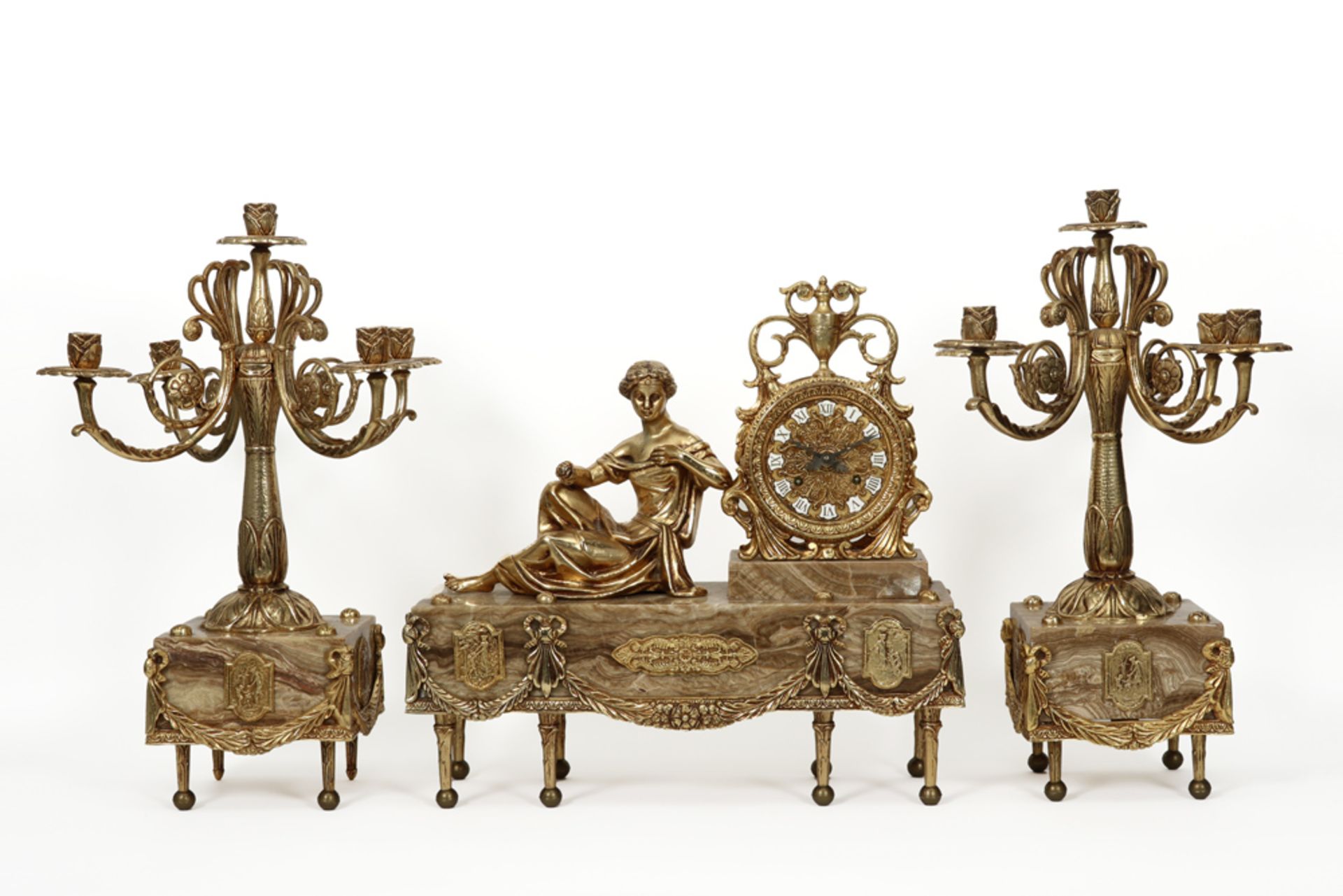 neoclassical 3pc garniture in onyx and gilded bronze : a pair of candelabra and a clock ||