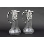 pair of "Gallia (Christofle)" marked Art Nouveau decanters in clear glass and silverplated pewter ||