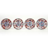 series of four 18th Cent. Chinese Imari plates with a convex medallion in porcelain || Serie van