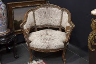 19th Cent. walnut armchair from Liège with finely sculpted Louis XV style ornamentation and
