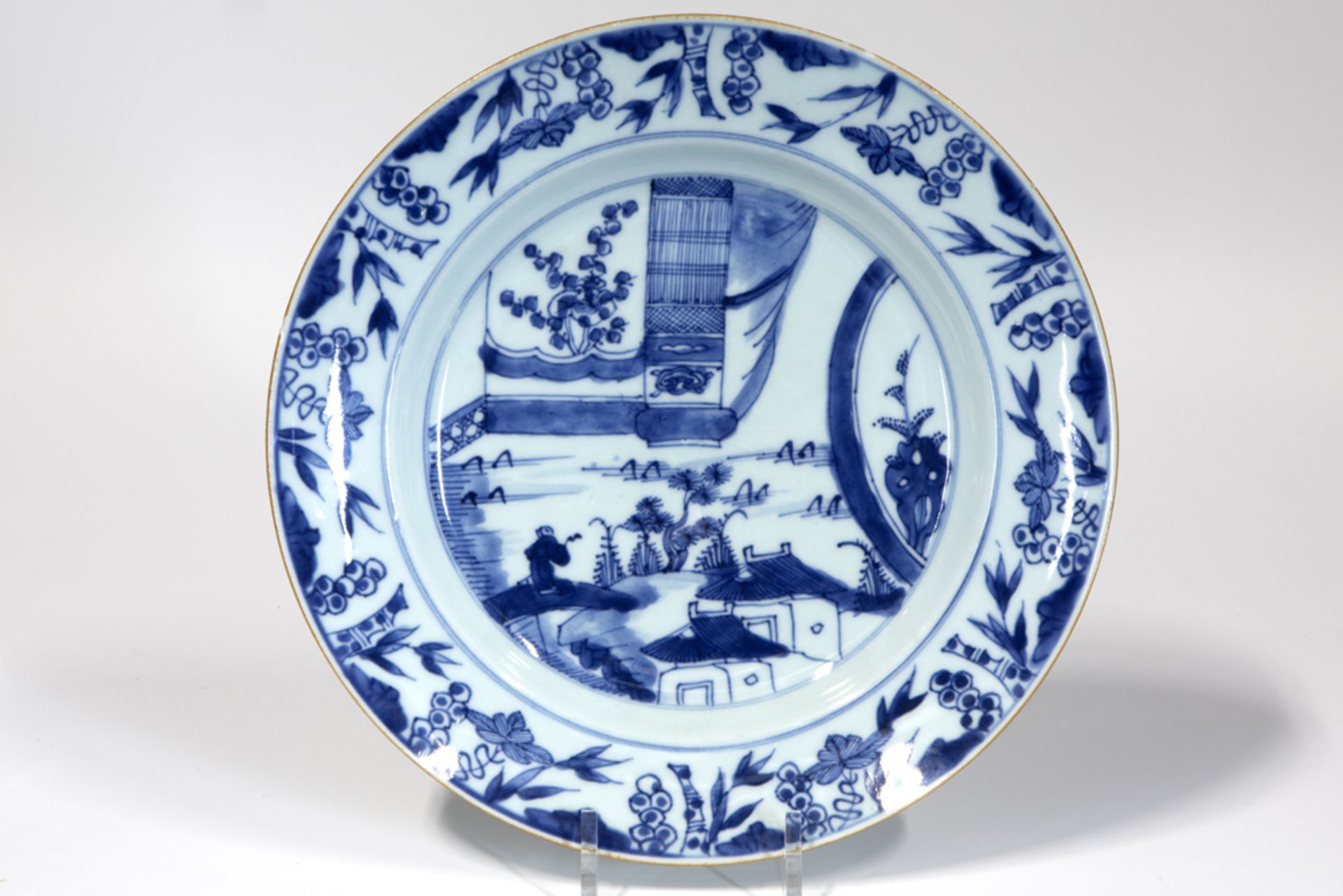 18th Cent. Chinese dish in porcelain with a blue-white decor with a figure in landscape ||