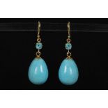 nice pair of earrings in yellow gold (18 carat) each with an apatite and a drop shaped
