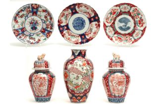 six pieces of antique Japanese Meiji period porcelain : a vase, three plates and a pair of