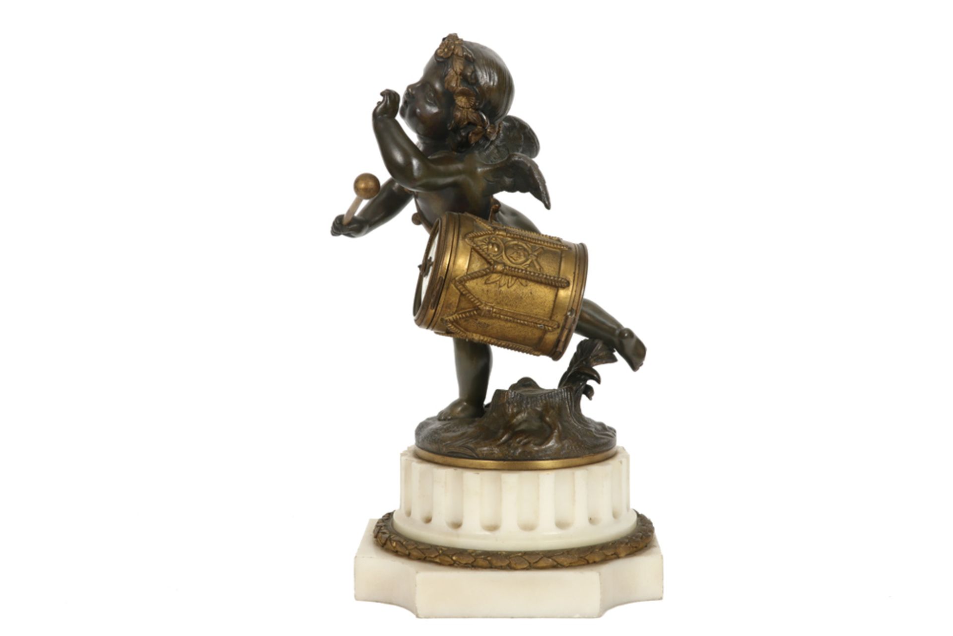 antique neoclassical sculpture with a cupid in partly decorated bronze that beats a drum, which - Image 2 of 6