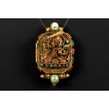 Tibeto Nepalese ghau in yellow gold on silver with turquoise, lapis lazuli and coral and with the