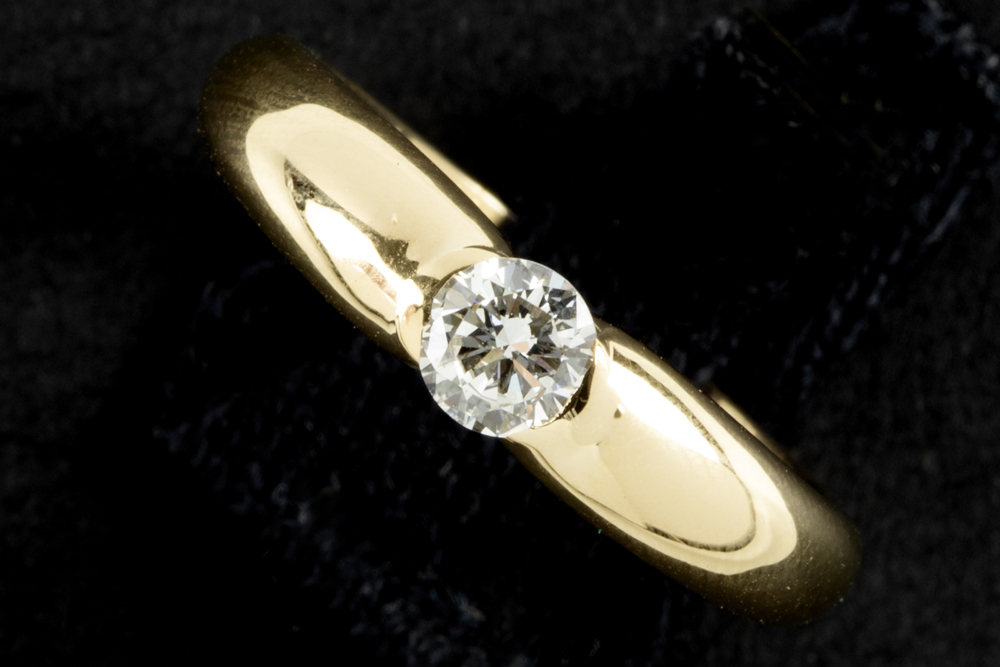 Cartier signed ring in yellow gold (18 carat) with a circa 0,35 carat high quality brilliant cut