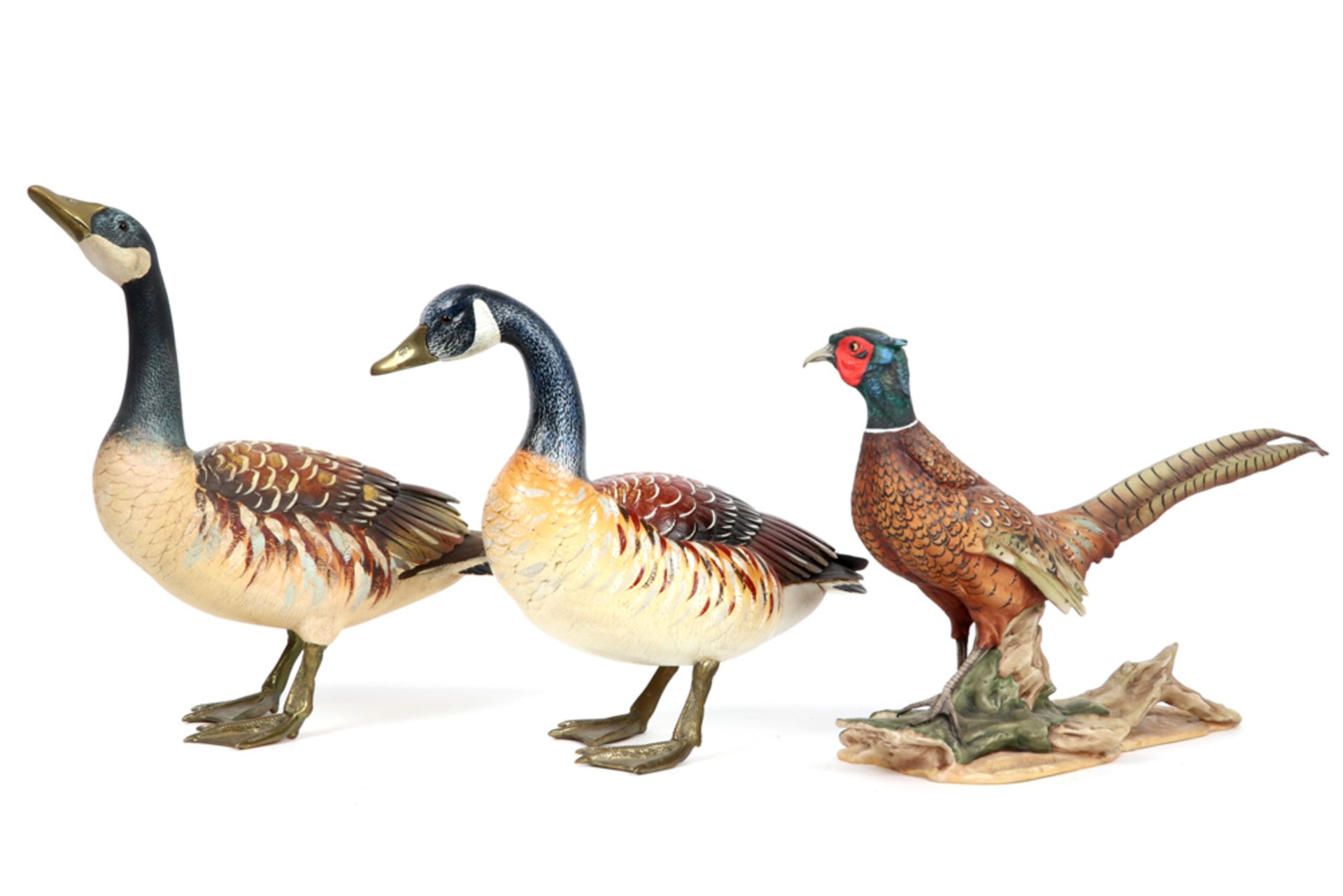 three sculptures : a porcelain pheasant and a couple of ducks with bronze feet marked "Elli - Bild 2 aus 3