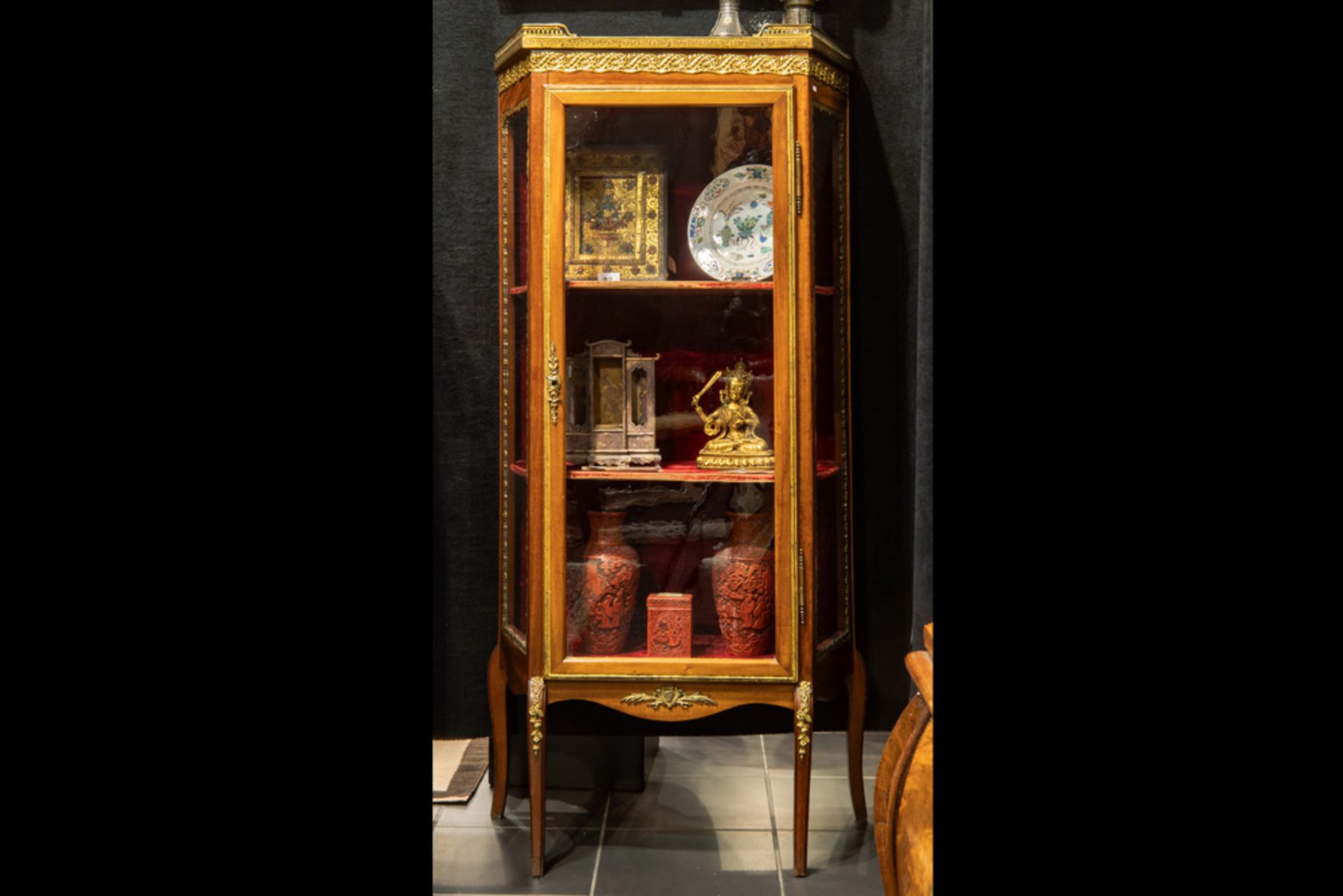 small 'antique' neoclassical display cabinet in walnut with mountings in bronze and with a marble