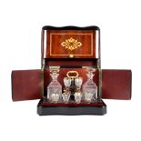 Napoleon III style cellaret with its case in marquetry and its crystal content || Likeurkeldertje in