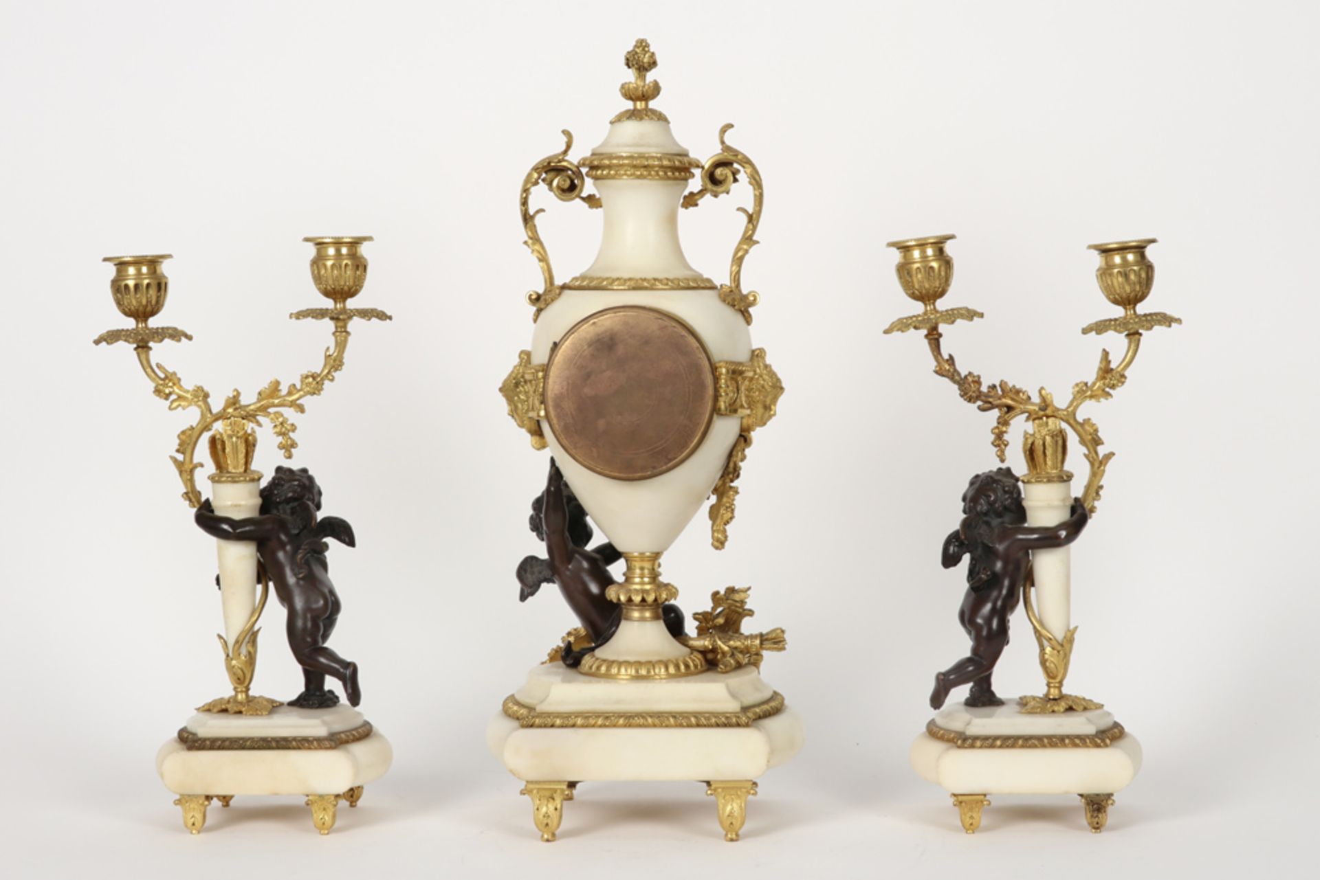 antique French neoclassical three piece garniture in marble and partly gilded bronze with a pair - Image 2 of 4