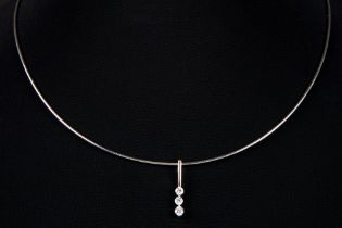 modern necklace with a pendant in white gold (18 carat) with ca 0,0 carat of quality brilliant cut