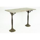 bistro table with feet in cast iron and marble top || Bistrotafeltje met twee gietijzeren voeten