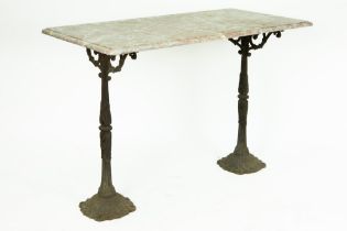 bistro table with feet in cast iron and marble top || Bistrotafeltje met twee gietijzeren voeten