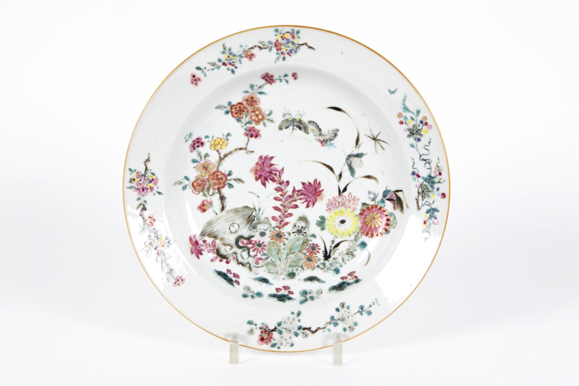 18th Cent. Chinese dish in porcelain with a 'Famille Rose' garden decor with flowers and