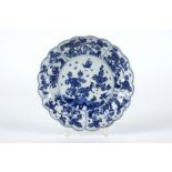 17th/18th Cent. Chinese Kang Xi period plate in marked porcelain with a floral blue-white decor with