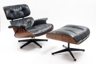 Charles Eames "Henry Miller" marked set of lounge chair and ottoman in plywood and black leather and