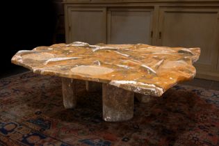fancy table made by the Belgian sculptor Joris Maes with a top in fossil stone with ammonites ||