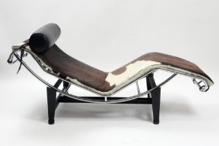 20th Cent. lounge chair after Le Corbusier's "LC4" design in partially chromed metal and with