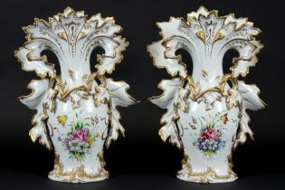 pair of vases in porcelain with a painted floral decor || Paar cornetvazen in porselein met een