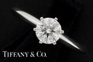 a Tiffany marked ring in platinum with a 0,76 carat high quality brilliant cut diamond with its box,