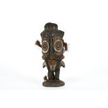 Papua New Guinean Middle Sepik sculpture depicting a ghost/spirit or god in wood with pigments ||