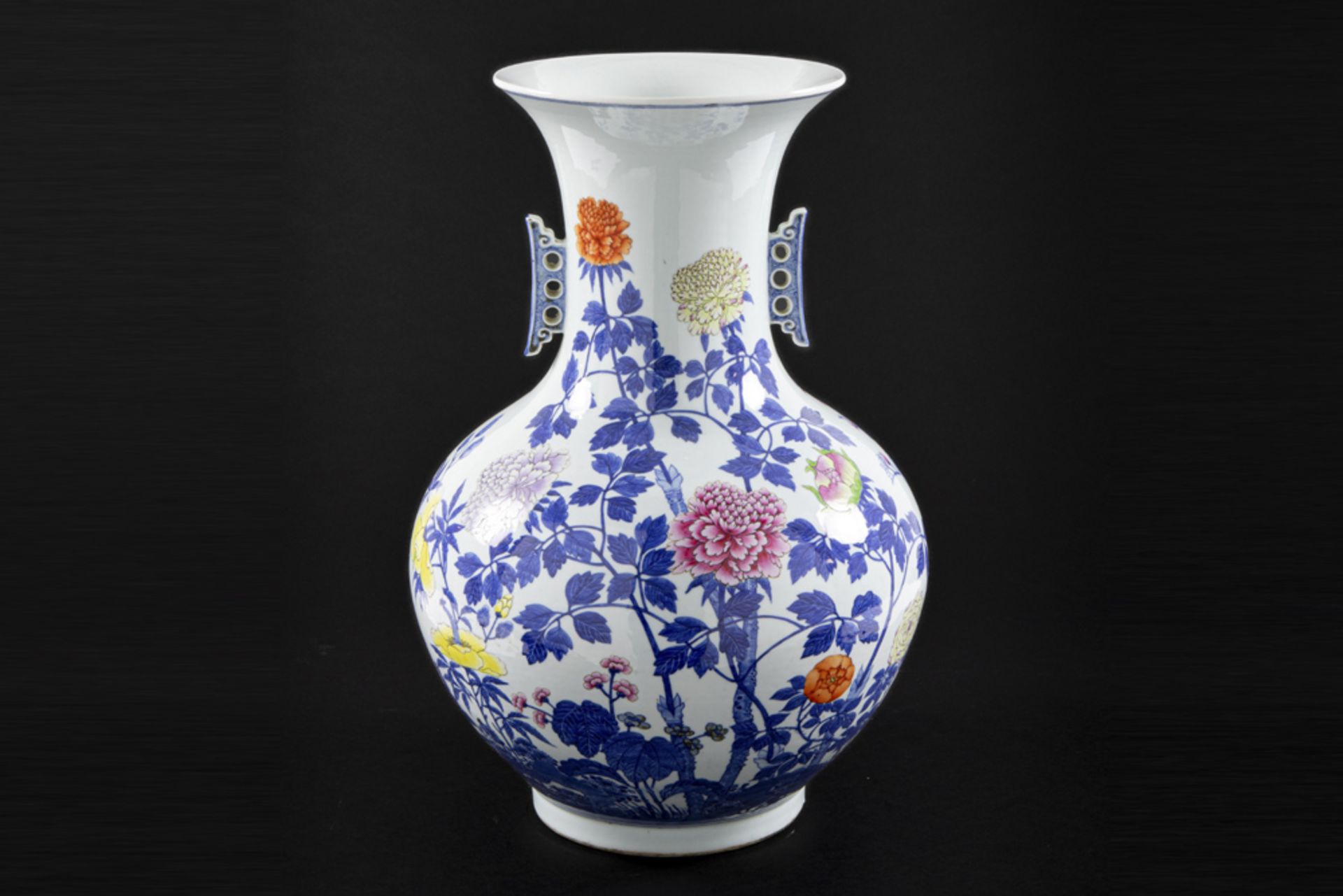 nice antique Chinese vase in marked porcelain with a blue-white and polychrome, floral decor ||