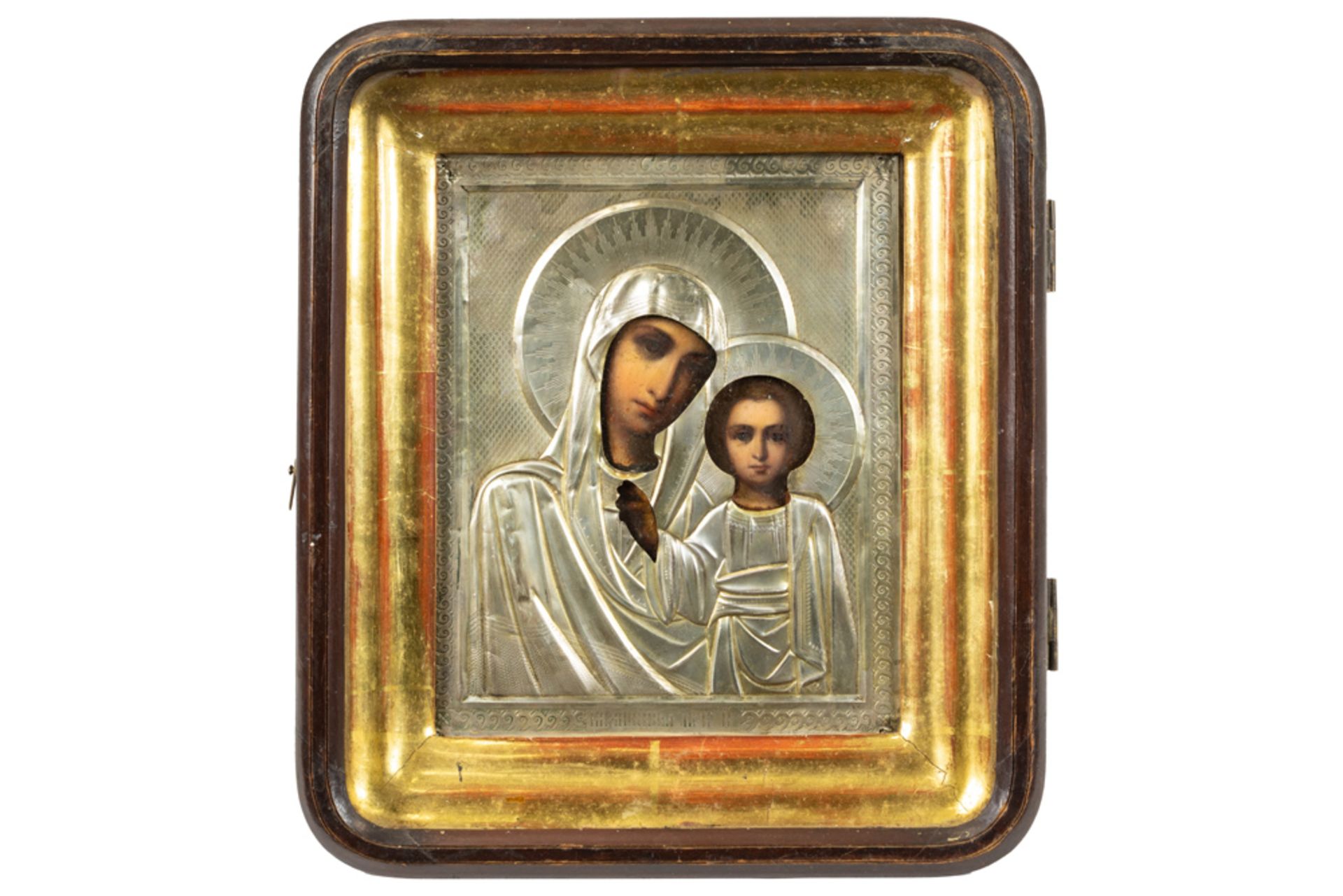 framed 19th Cent. Russian icon with rizza || Ingekaderde negentiende eeuwse Russische icoon met