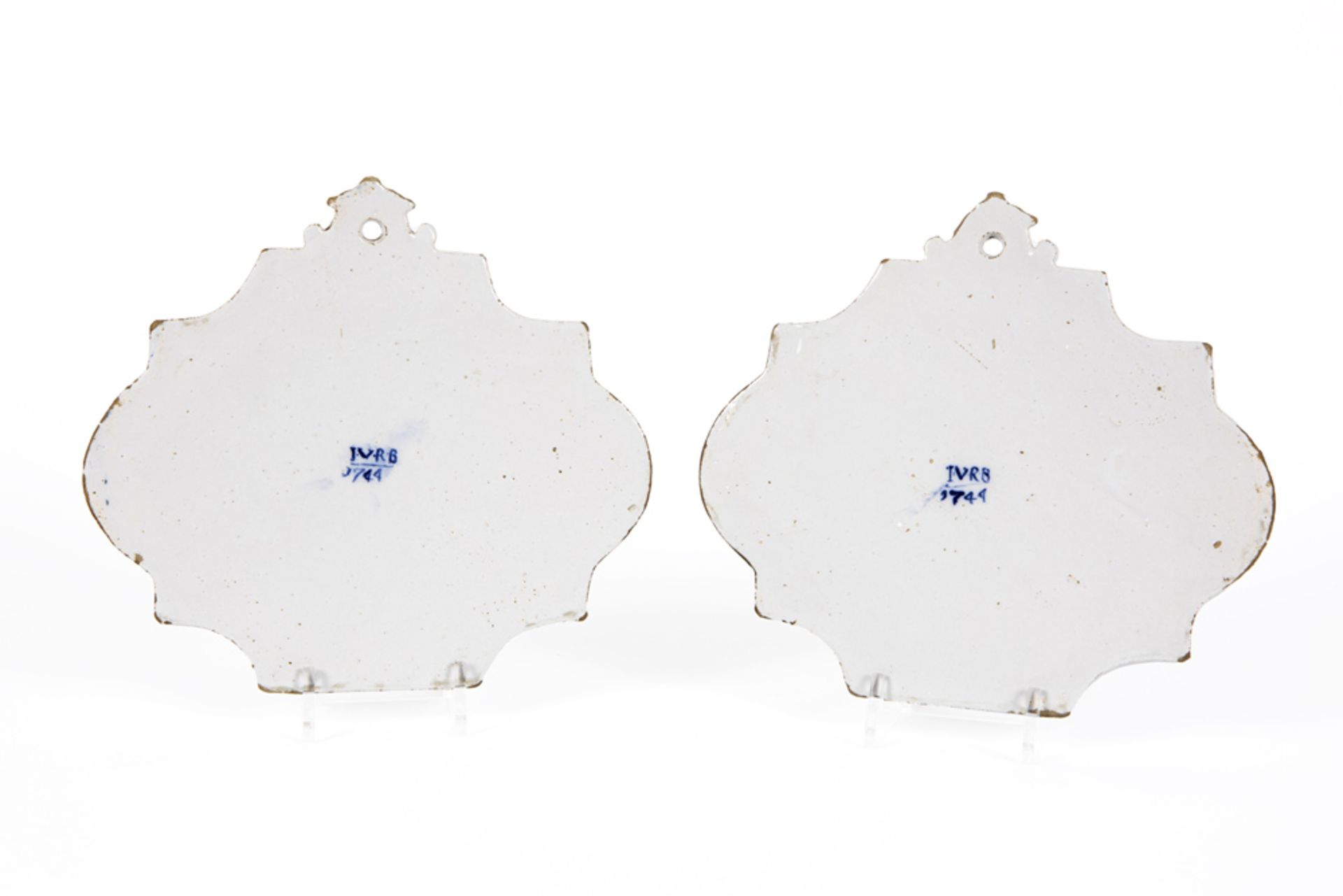 pair of presumably 18th Cent plaques in ceramic from Delft, marked IVRN 1744, with a baroque style - Image 2 of 3