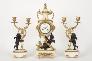 antique French neoclassical three piece garniture in marble and partly gilded bronze with a pair