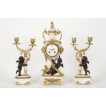 antique French neoclassical three piece garniture in marble and partly gilded bronze with a pair