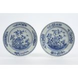 pair of 18th Cent. Chinese plates with a blue-white garden decor || Paar achttiende eeuwse Chinese