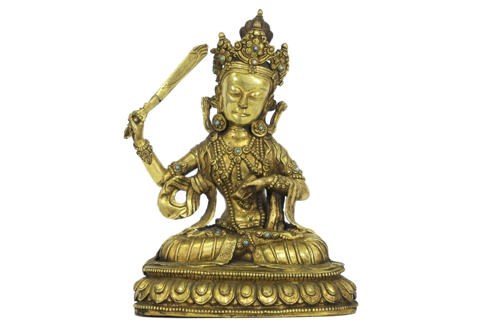 antique Bhutanese sculpture (with typical Bhutanese large head) in guilded bronze inlaid with