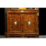 mid 19th Cent. European neoclassical cabinet in burr of walnut with mountings in guilded bronze