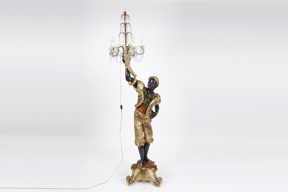 "Venetian Moor" sculpture in richly polychromed wood with a lamp in partially coloured glass ||