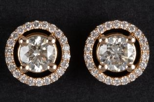 pair of earrings in pink gold (18 carat) each with a circa 0,50 carat brilliant cut diamond (