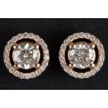 pair of earrings in pink gold (18 carat) each with a circa 0,50 carat brilliant cut diamond (