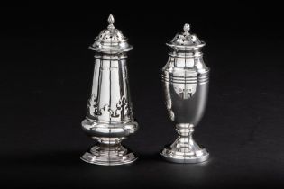 two English casters in marked silver, one from Birmingham dated 1958 & one from London dated 1915 ||