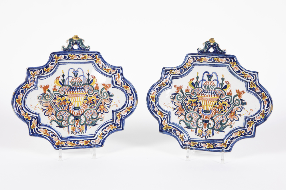 pair of presumably 18th Cent plaques in ceramic from Delft, marked IVRN 1744, with a baroque style