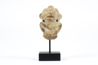 Caribbean Taino Culture bone sculpture/pendant with a stylised anthropomorphic design with a