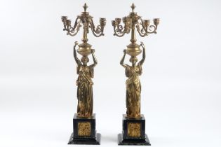 pair of 'antique' caryatid candelabra in gilded bronze and marble each with an Ancient Roman lady ||