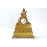 19th Cent. clock with case in gilded bronze and with marked work || Negentiende eeuwse klok met kast
