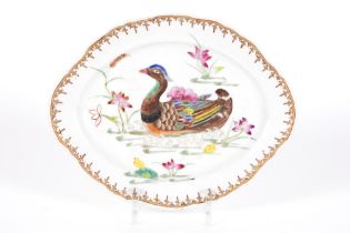 18th Cent. Chinese dish in porcelain with a 'Famille Rose' decor with a duck in a pond || Achttiende